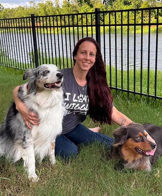 Erika, expert dog trainer in St. Augustine, FL, with his dog.