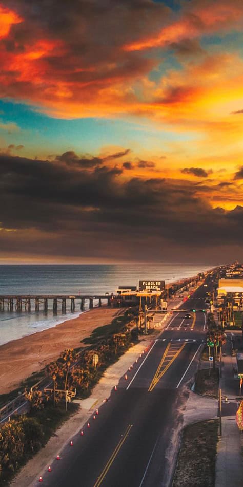 Beach strip with a pier, ideal for dog training in Flagler Beach, FL.