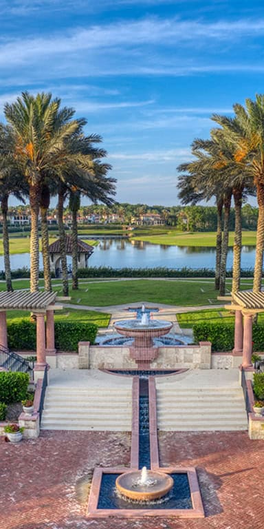 Waterfront park with a fountain, ideal for dog training in Palencia, FL.