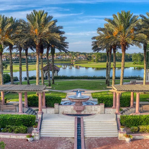 Waterfront park with a fountain, ideal for dog training in Palencia, FL.